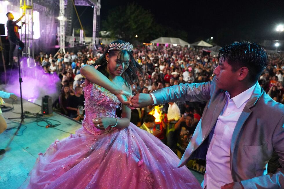 Isela Anahí Santiago Morales baila durante su Quinceañera en un estadio en Axtla de Terrazas,...